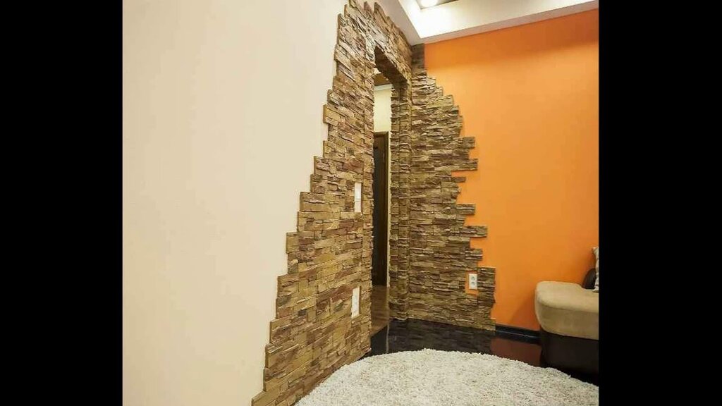 An arch made of decorative stone in the hallway 13 фото