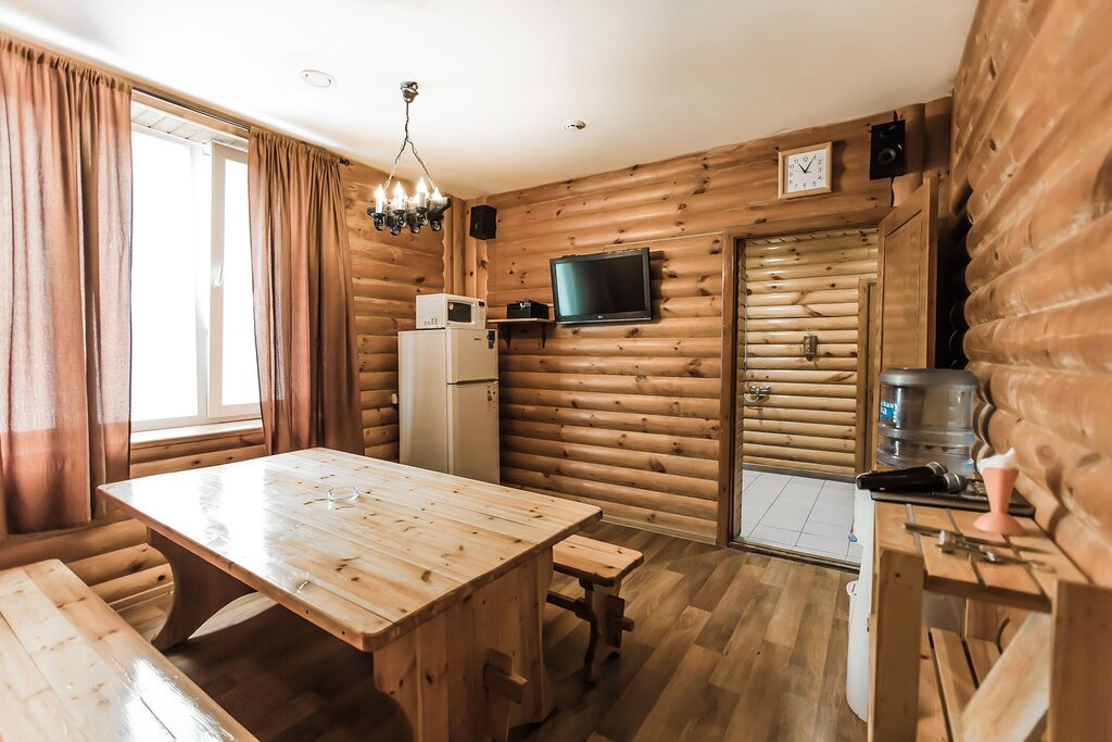 A bathhouse with a kitchen and a room