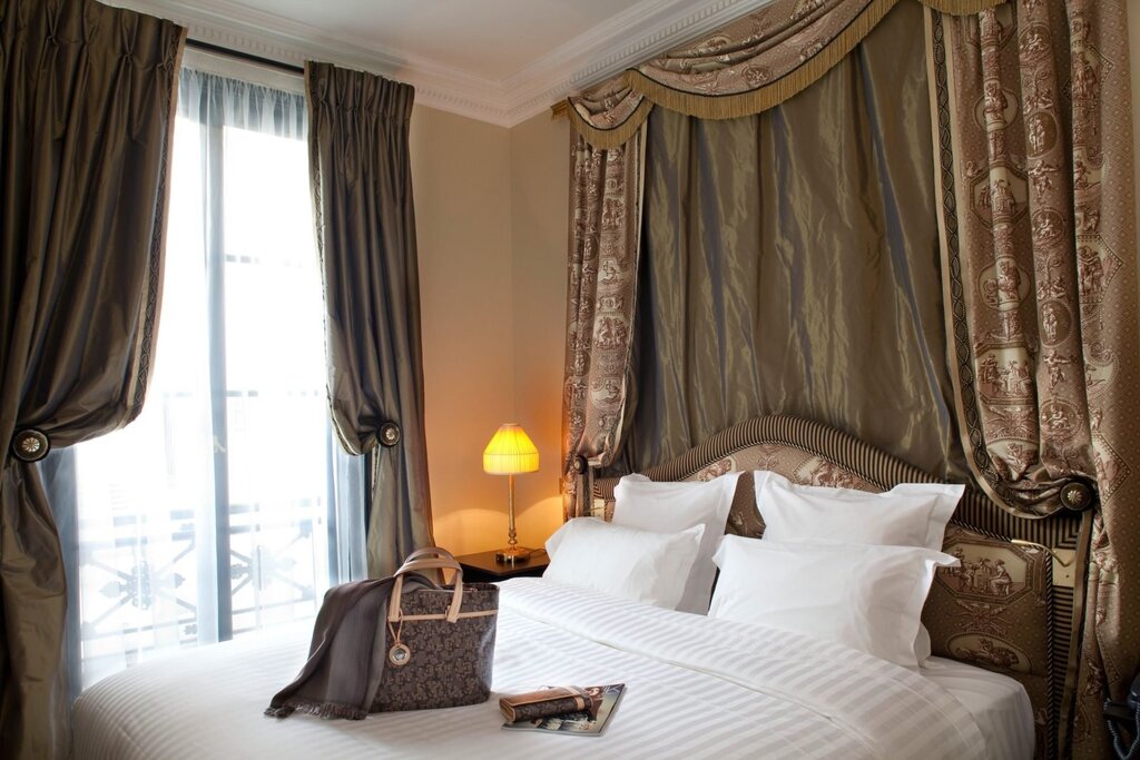 Velvet curtains in the bedroom interior