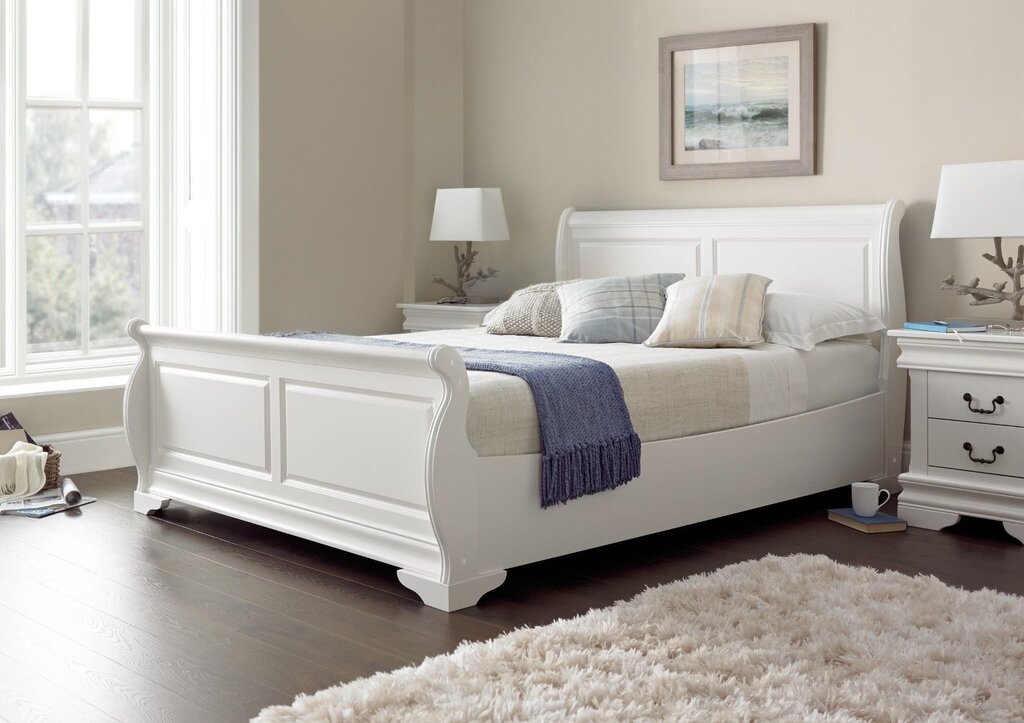 White wooden bed