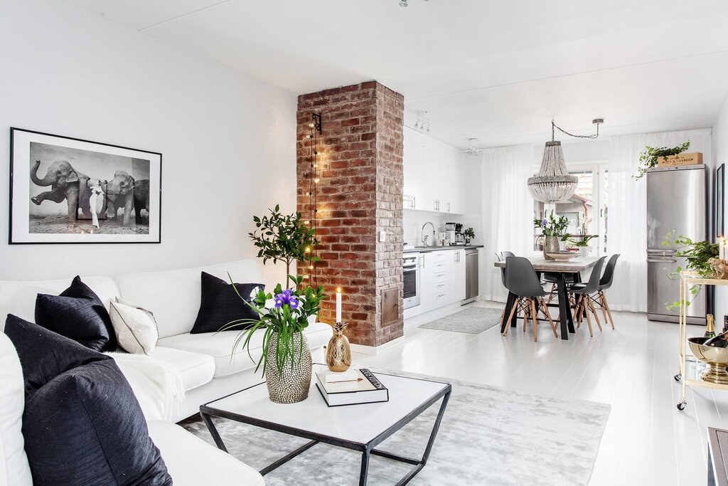 White brick wall in the living room interior 19 фото