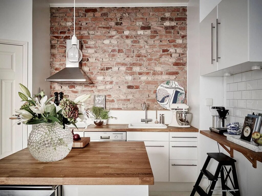 White brick wall in the kitchen interior