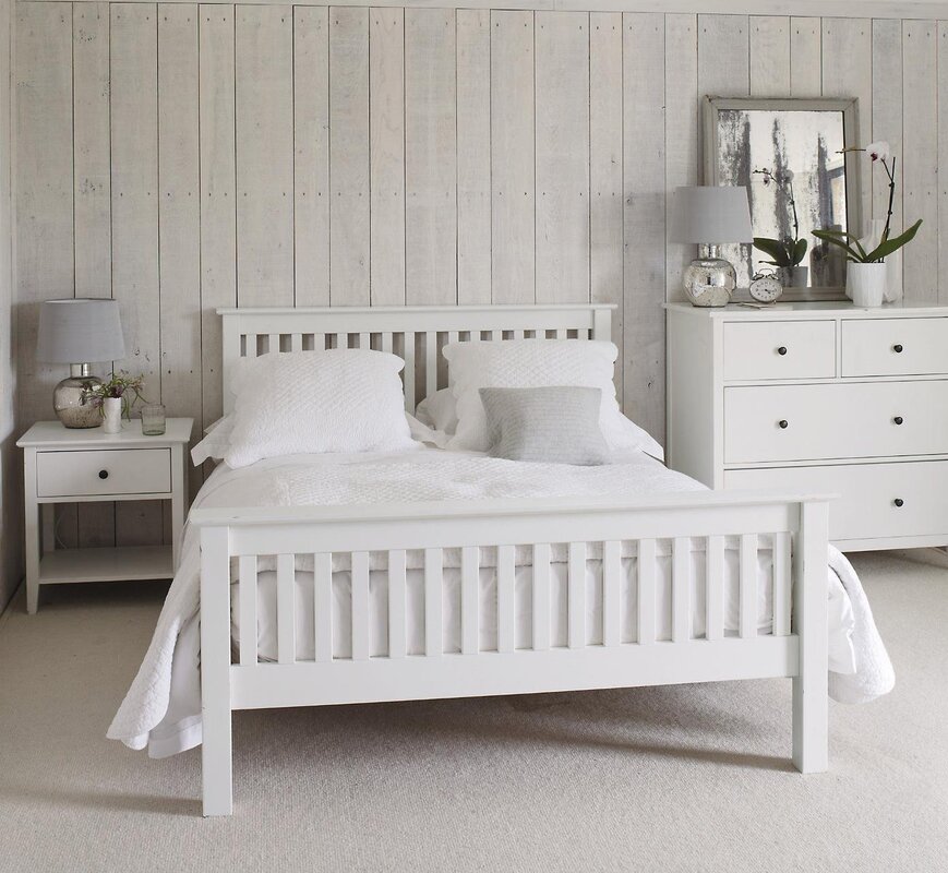 White wooden bed