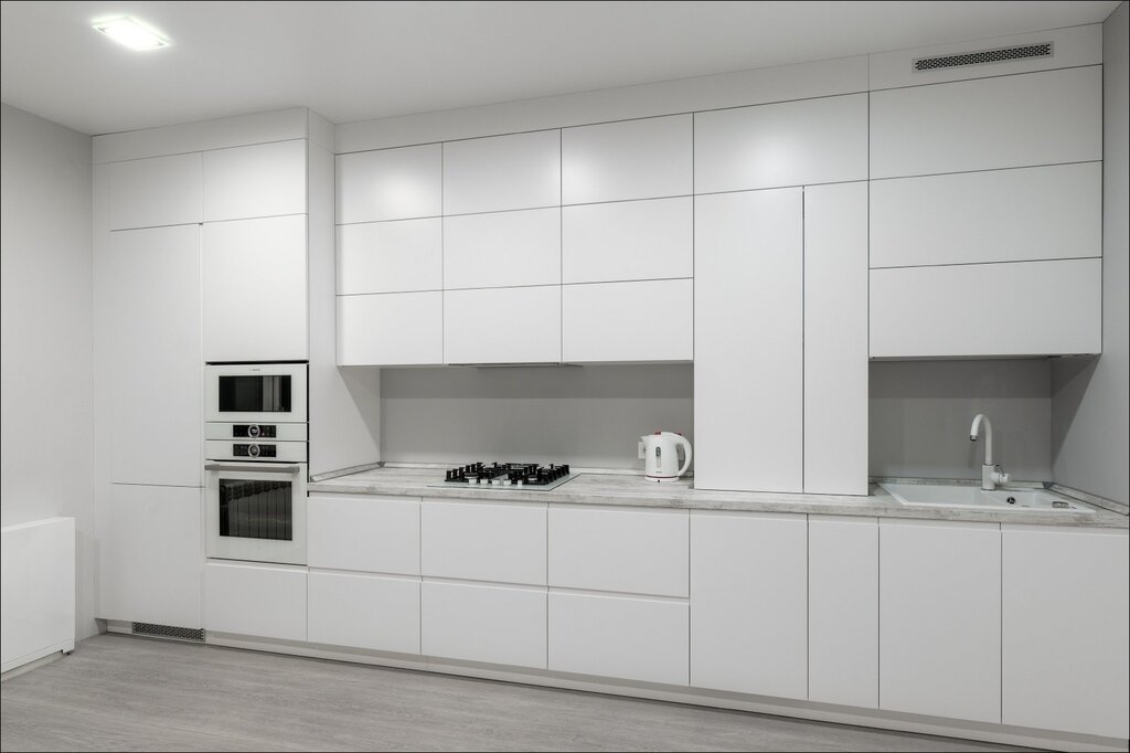 White kitchen without handles