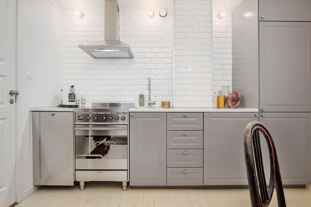 White kitchen without upper cabinets