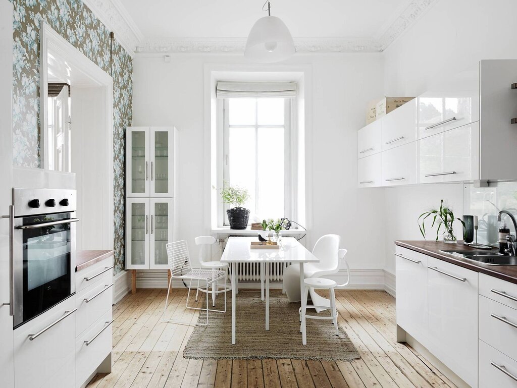 White kitchen and white wallpaper