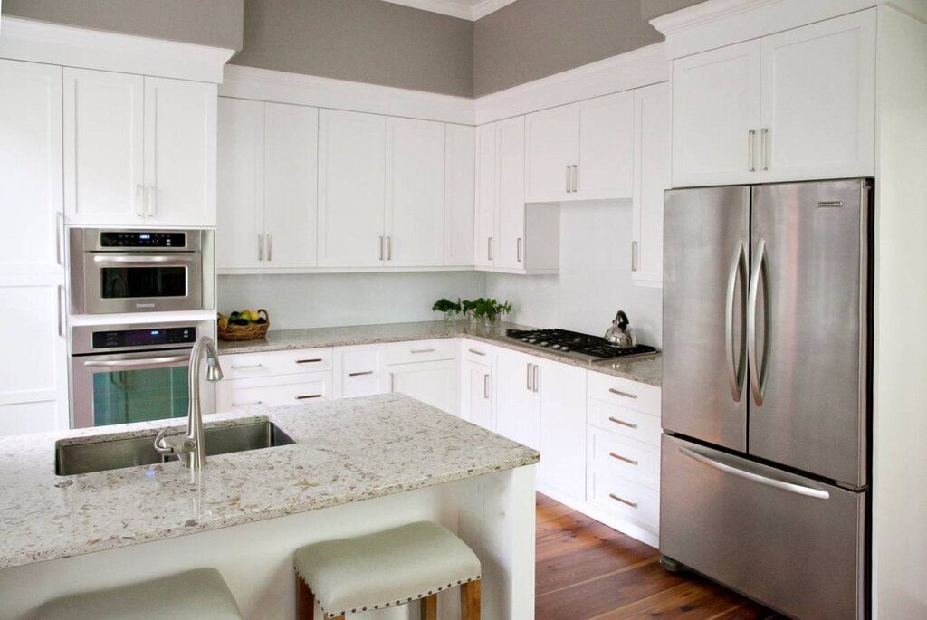 White kitchen with a white countertop