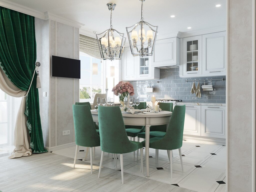 A white kitchen with emerald chairs