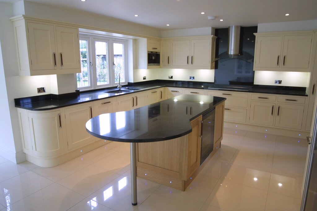 White kitchen with a stone countertop