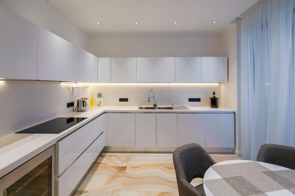 White kitchen with lighting