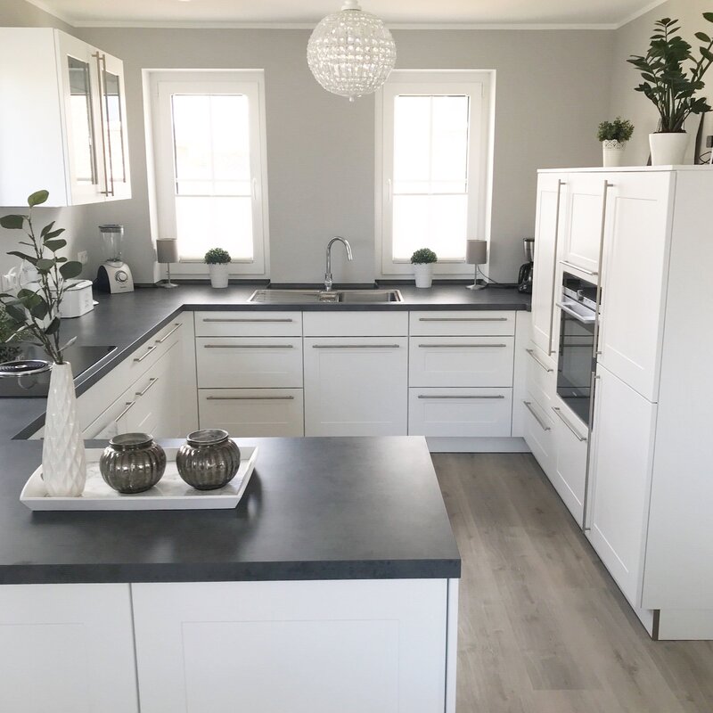 White kitchen with a gray countertop