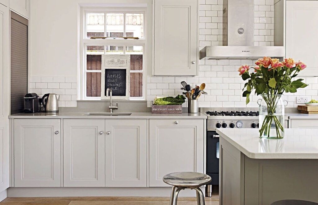 White kitchen with a dark wooden countertop