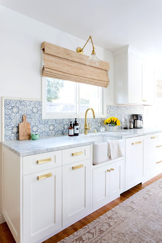 White kitchen with gold handles