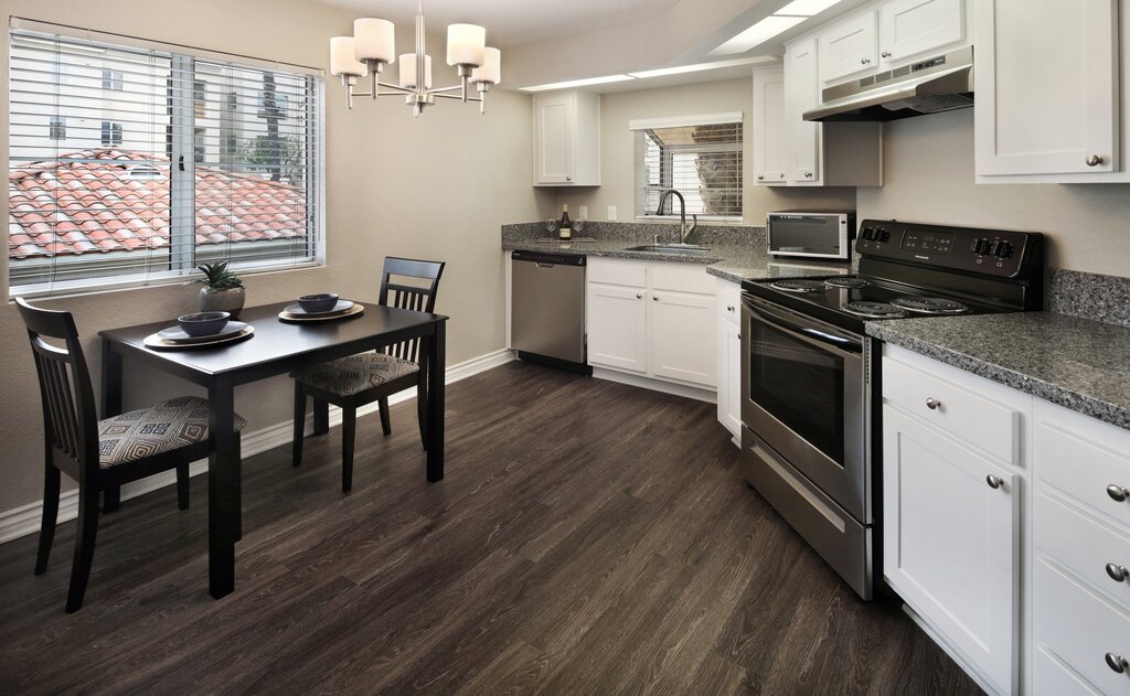 White kitchen dark gray floor