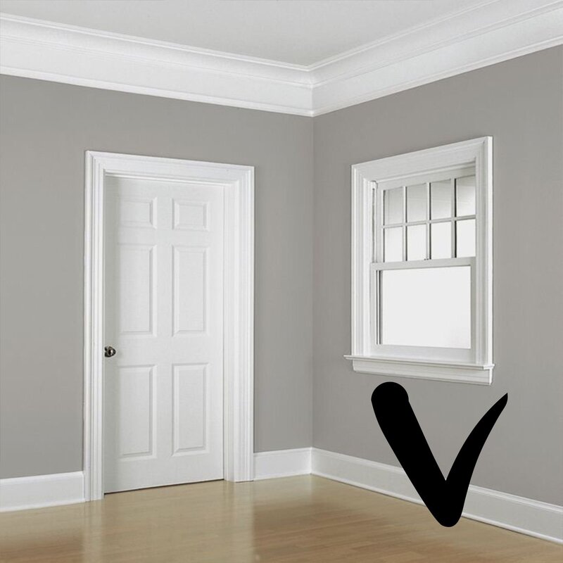 White walls, black baseboard