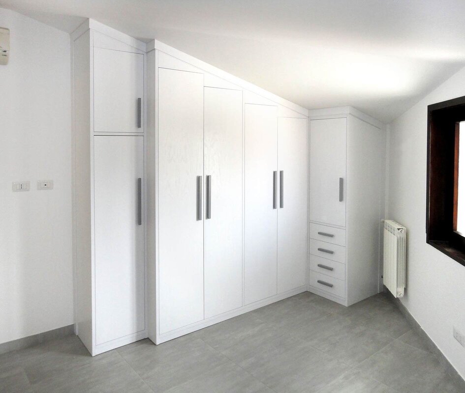 White glossy wardrobe for the hallway