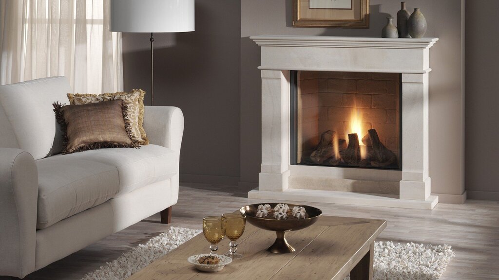 A white fireplace in the interior