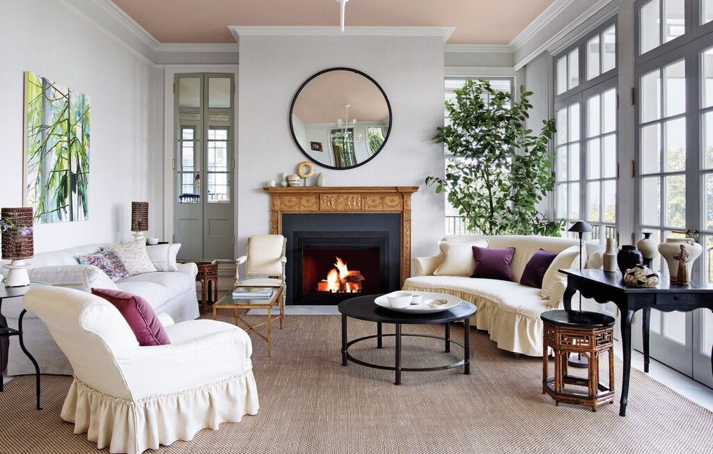 White fireplace in the living room interior