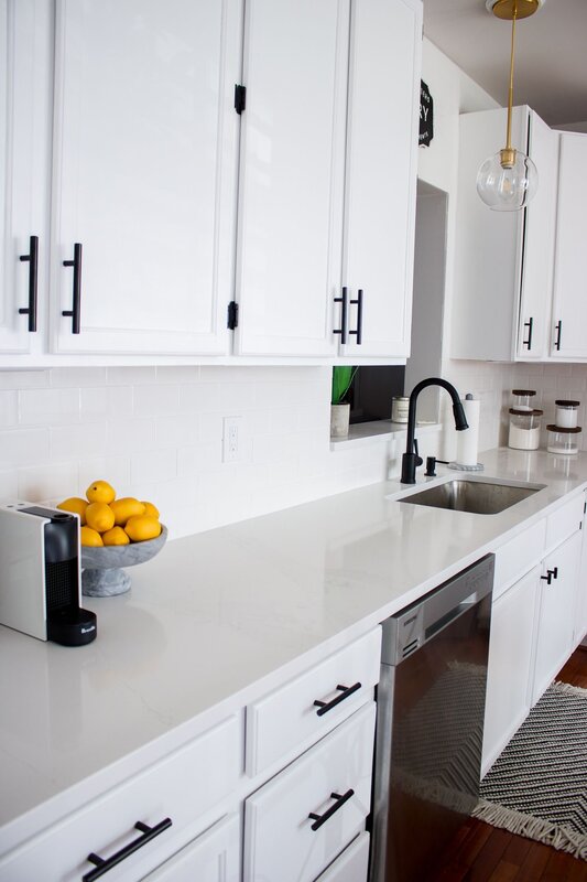 White kitchen set with black handles