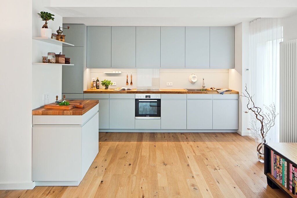 White kitchen set with a wooden countertop