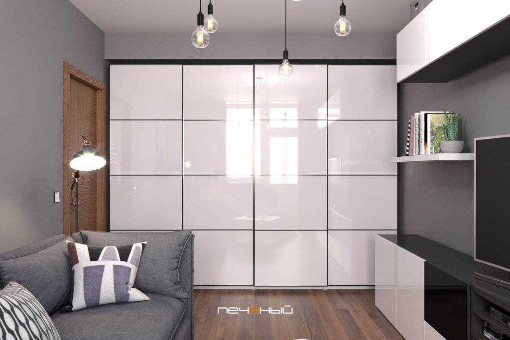 A white wardrobe in the living room interior