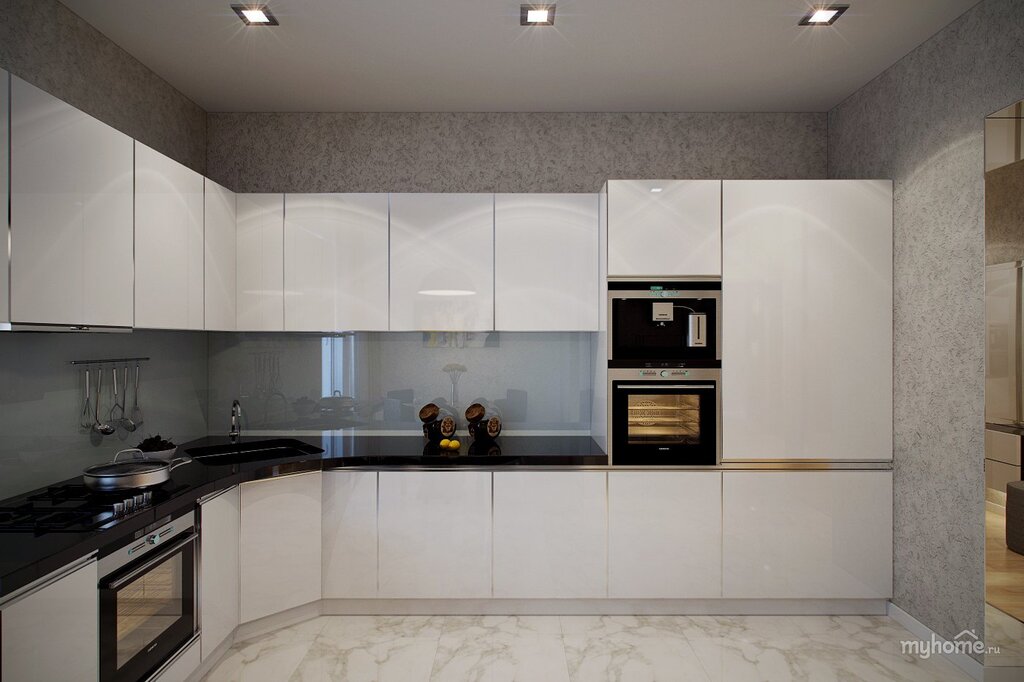 Beige kitchen with black appliances