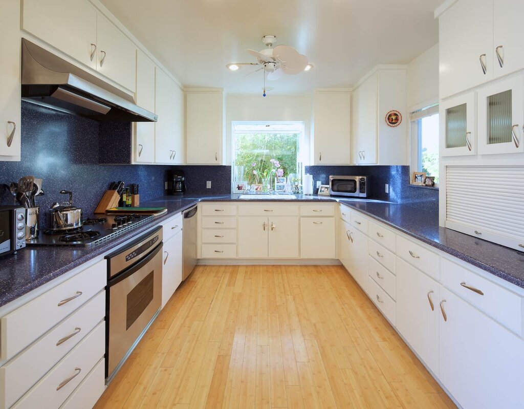 Beige kitchen with a brown countertop