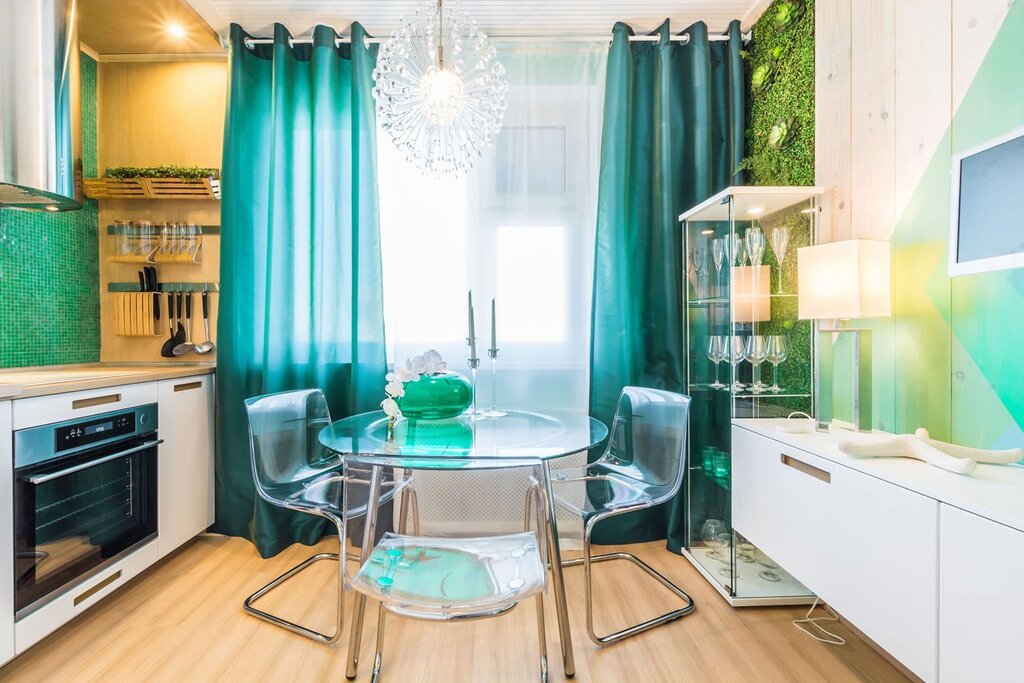 Turquoise curtains in the kitchen interior