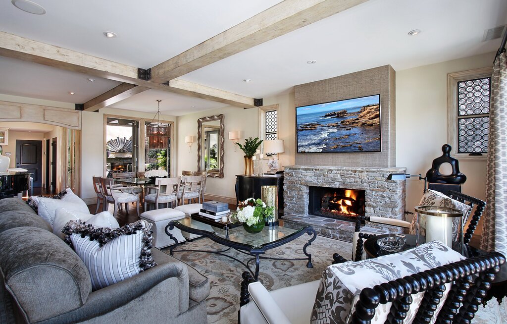 A large living room with a fireplace