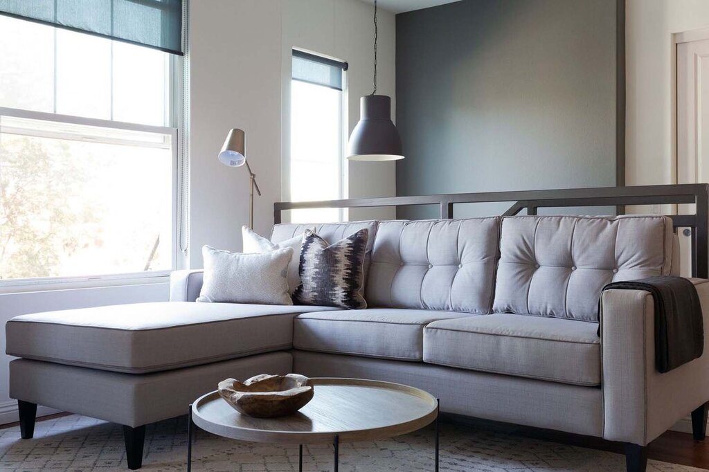 A large floor lamp over the sofa