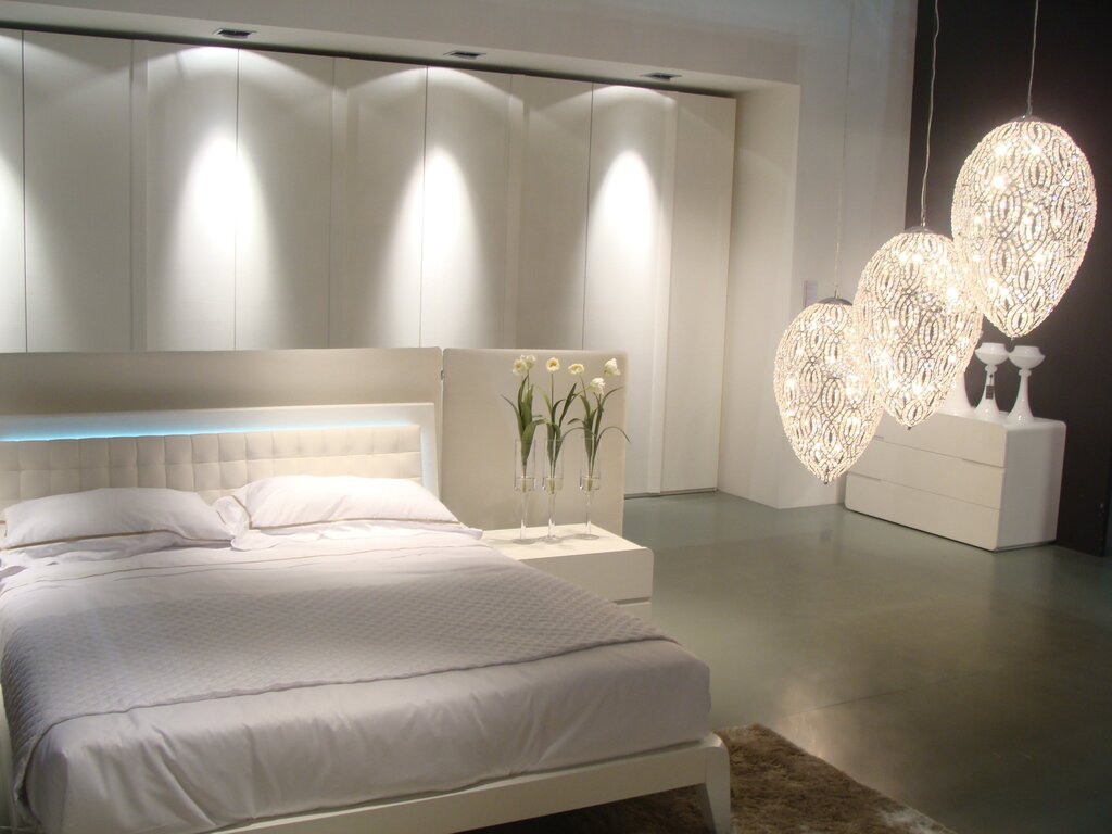 Wall lamp for a bedroom in a modern style