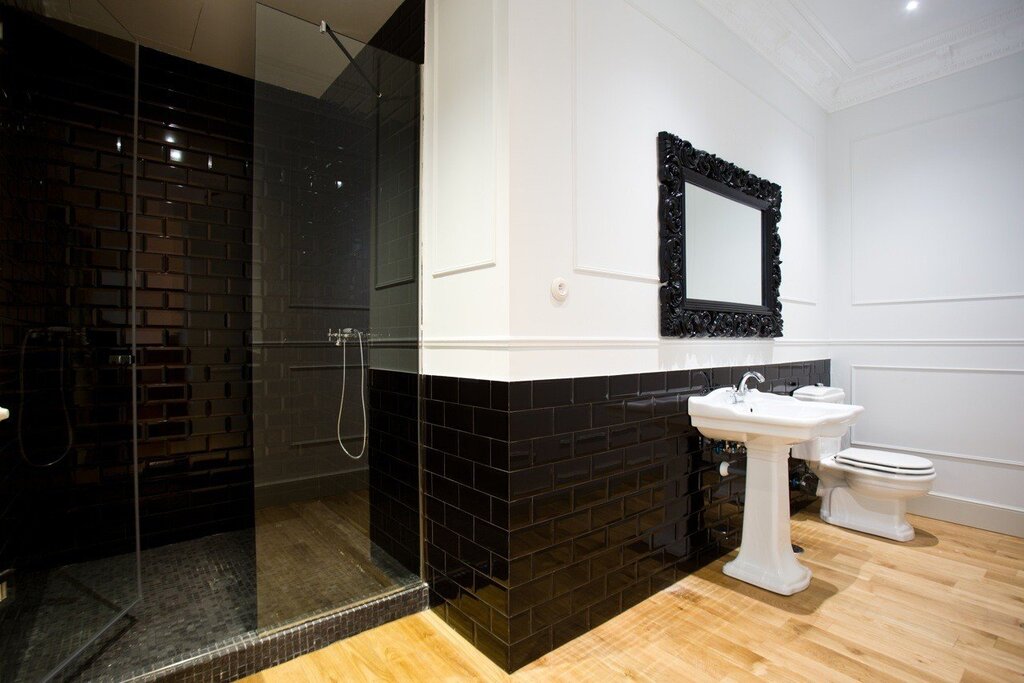 Black tiles on the bathroom floor