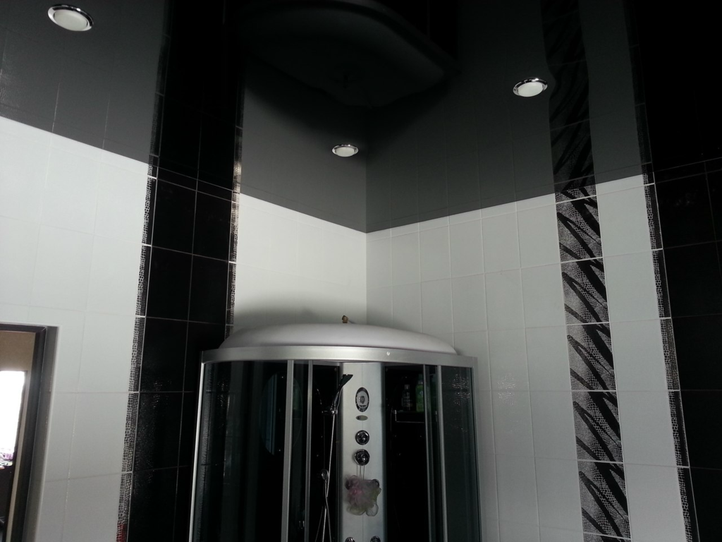 Black matte stretch ceiling in the bathroom