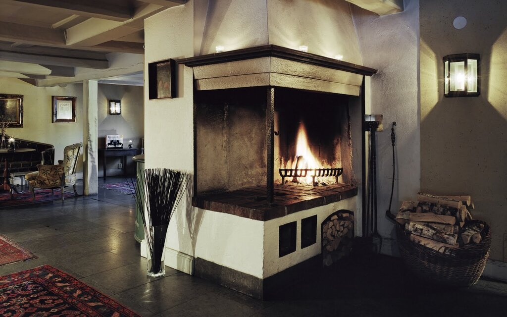 A cast-iron fireplace in the interior