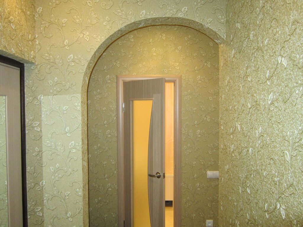 Decorative finish of the arch in the apartment