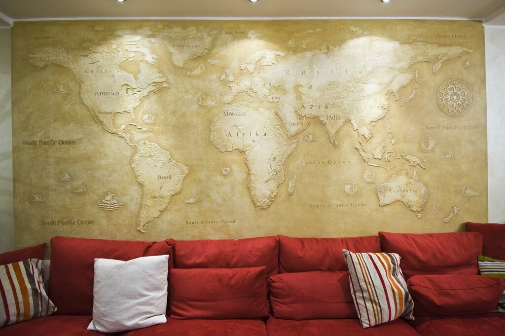 Decorative plaster world map in the interior