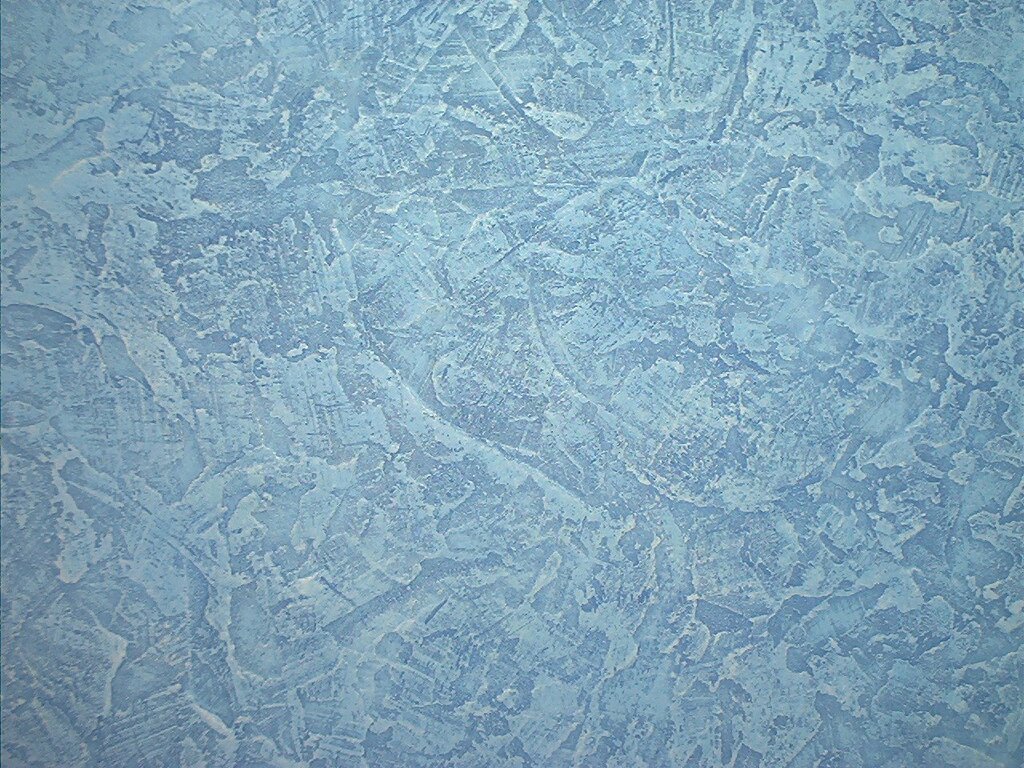 Decorative plaster in gray-blue