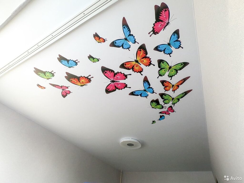 Decorative stickers for a stretch ceiling