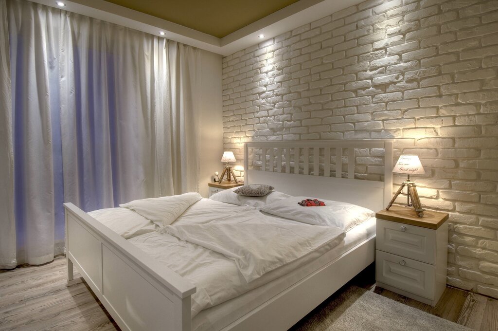 Decorative brick in the bedroom interior 34 фото