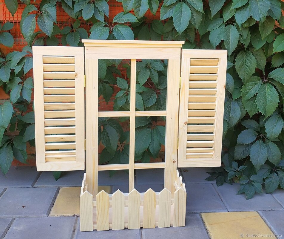 Decorative window with shutters