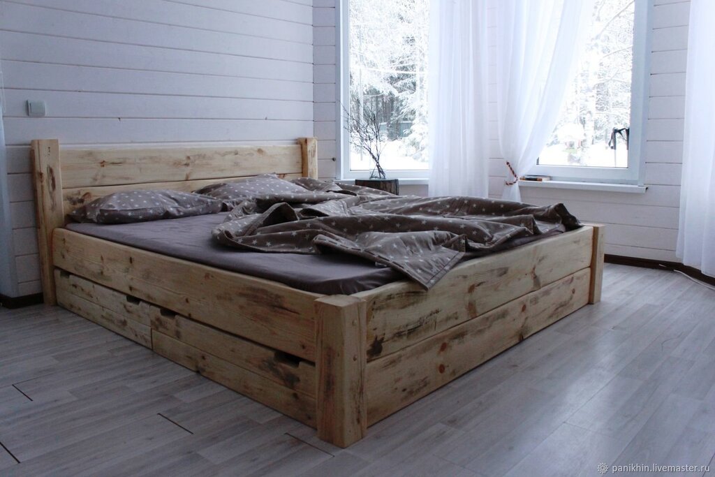 Wooden bed with drawers