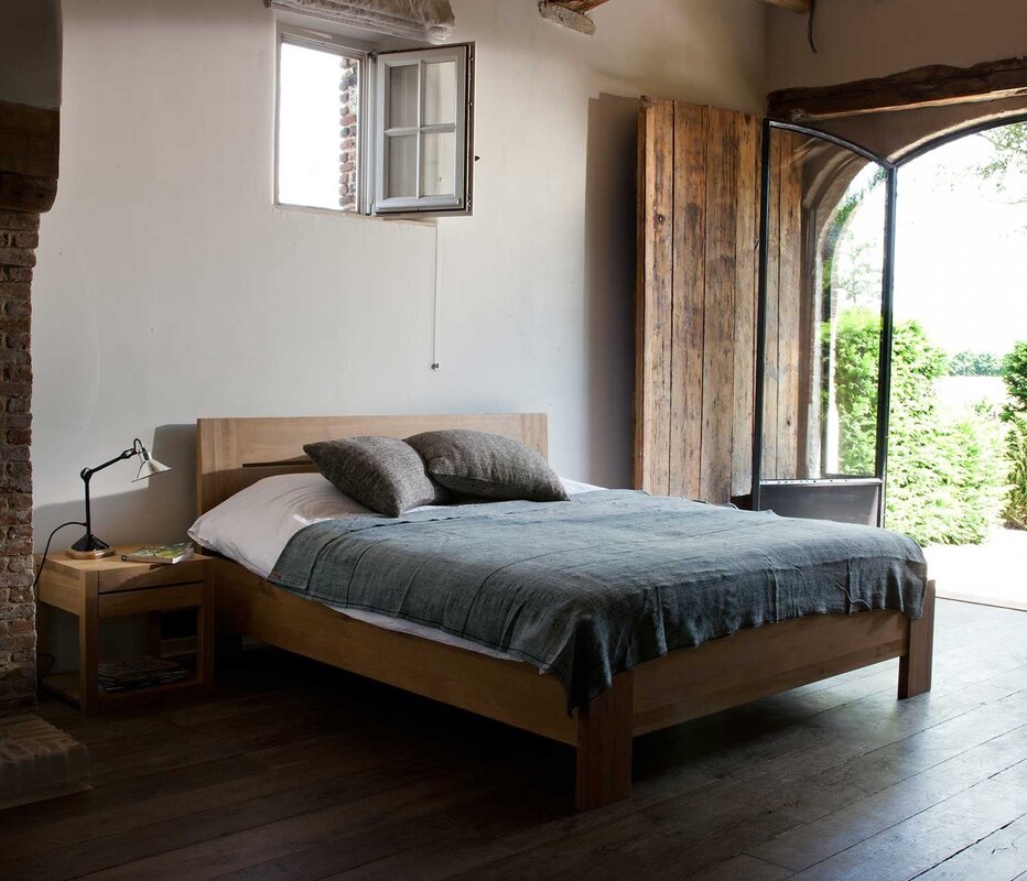 Wooden bed in the interior