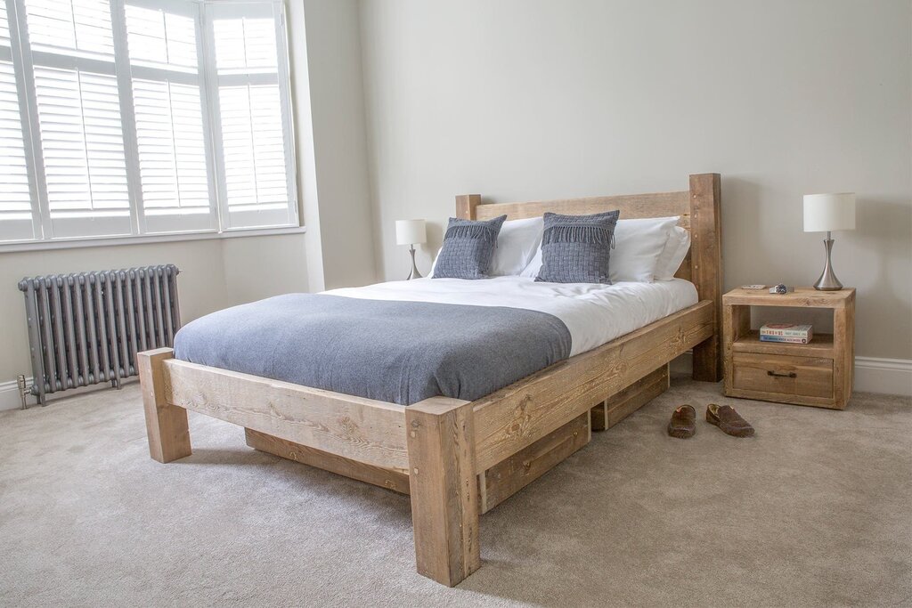 Wooden bed in Scandinavian style