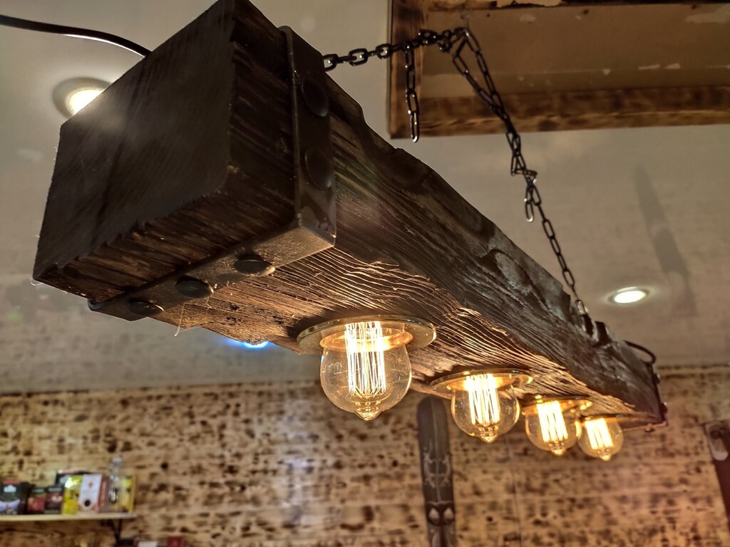 Wooden chandelier on chains