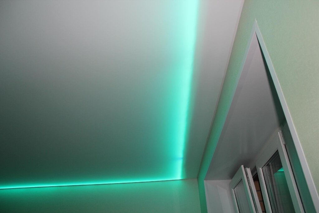 LED strip around the perimeter of the ceiling