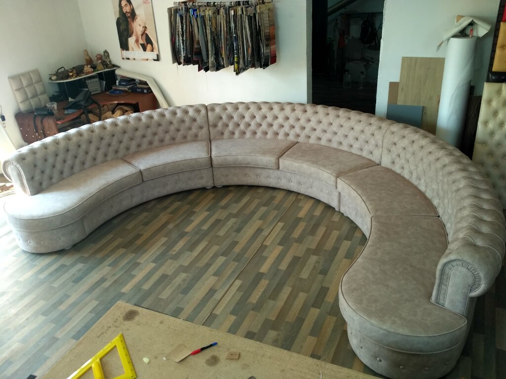 A sofa with a rounded corner