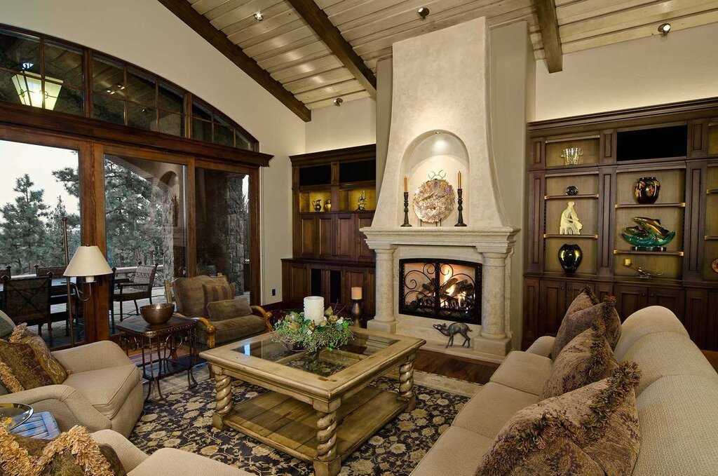 The design of the living room in a house with a fireplace