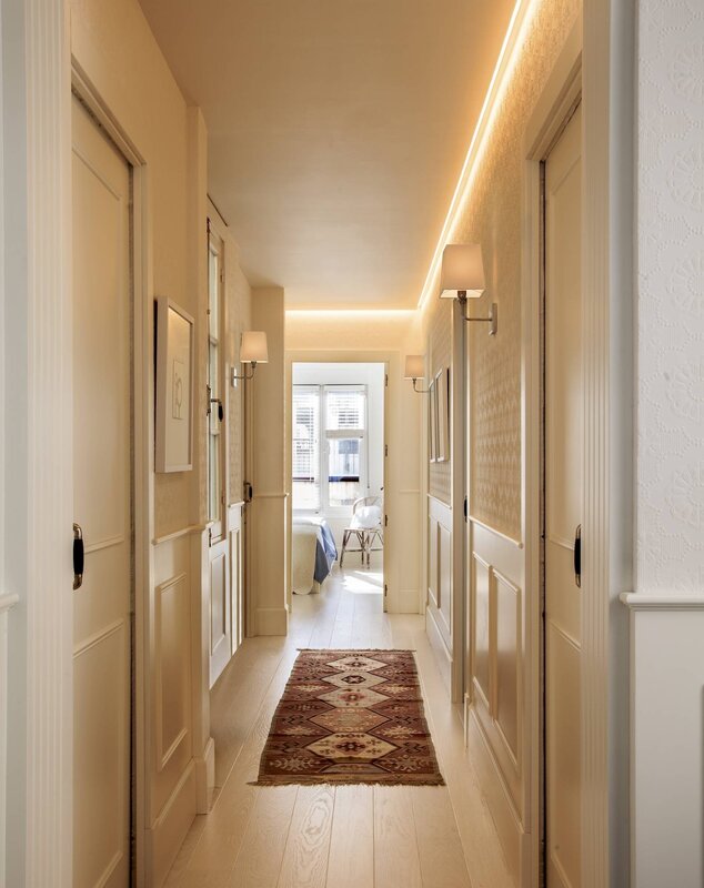 A long corridor with doors