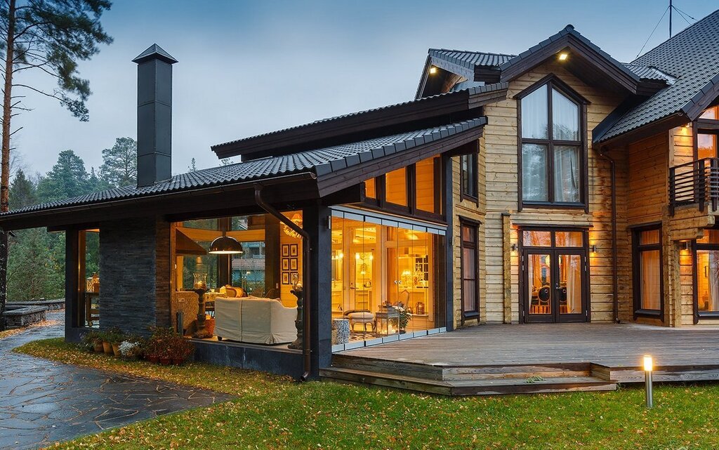 House with panoramic windows and a terrace