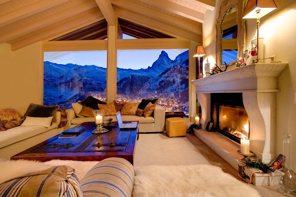 A little house in the mountains with a fireplace